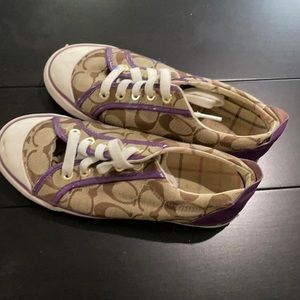 Brown coach tennis shoes with purple detail